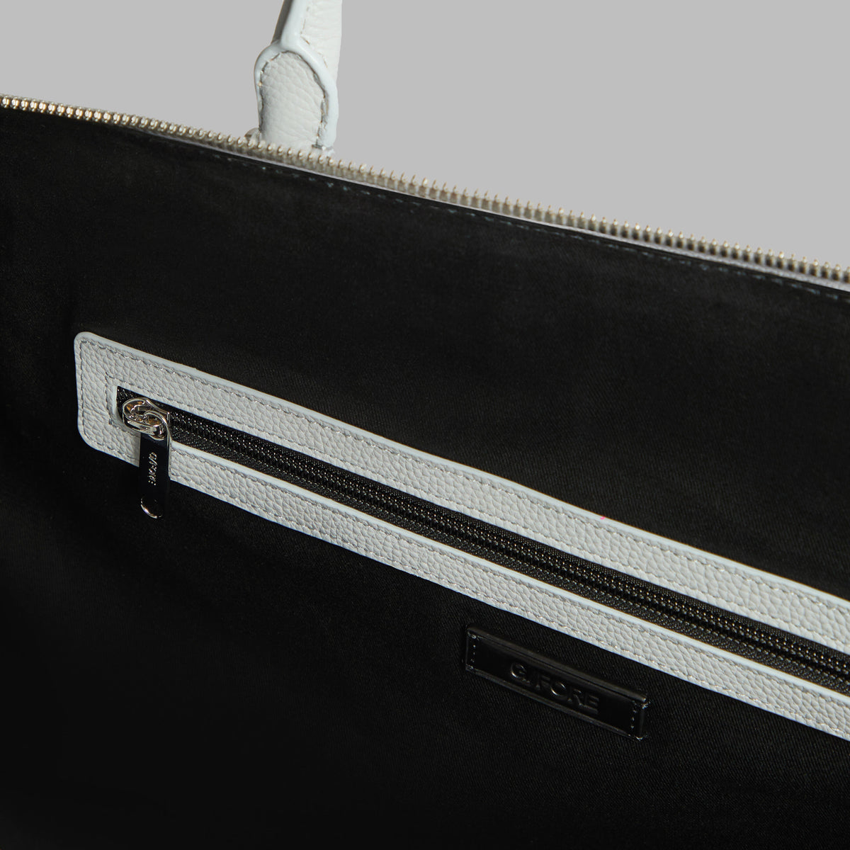 G/FORE EMBOSSED SKULL & TEES LEATHER WEEKENDER